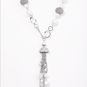 Rhinestone and pearl necklace and earring set.